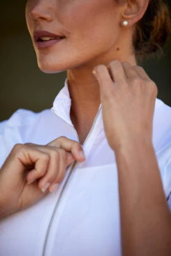 Ariat Womens Ascent 1/4 Zip Short Sleeve Show Shirt 39 Ariat Womens Ascent 1/4 Zip Short Sleeve Show Shirt -Equestrian Supplies Shop S23 WMS ENGL Carmel LaCunha Shot 02 8218 RTL